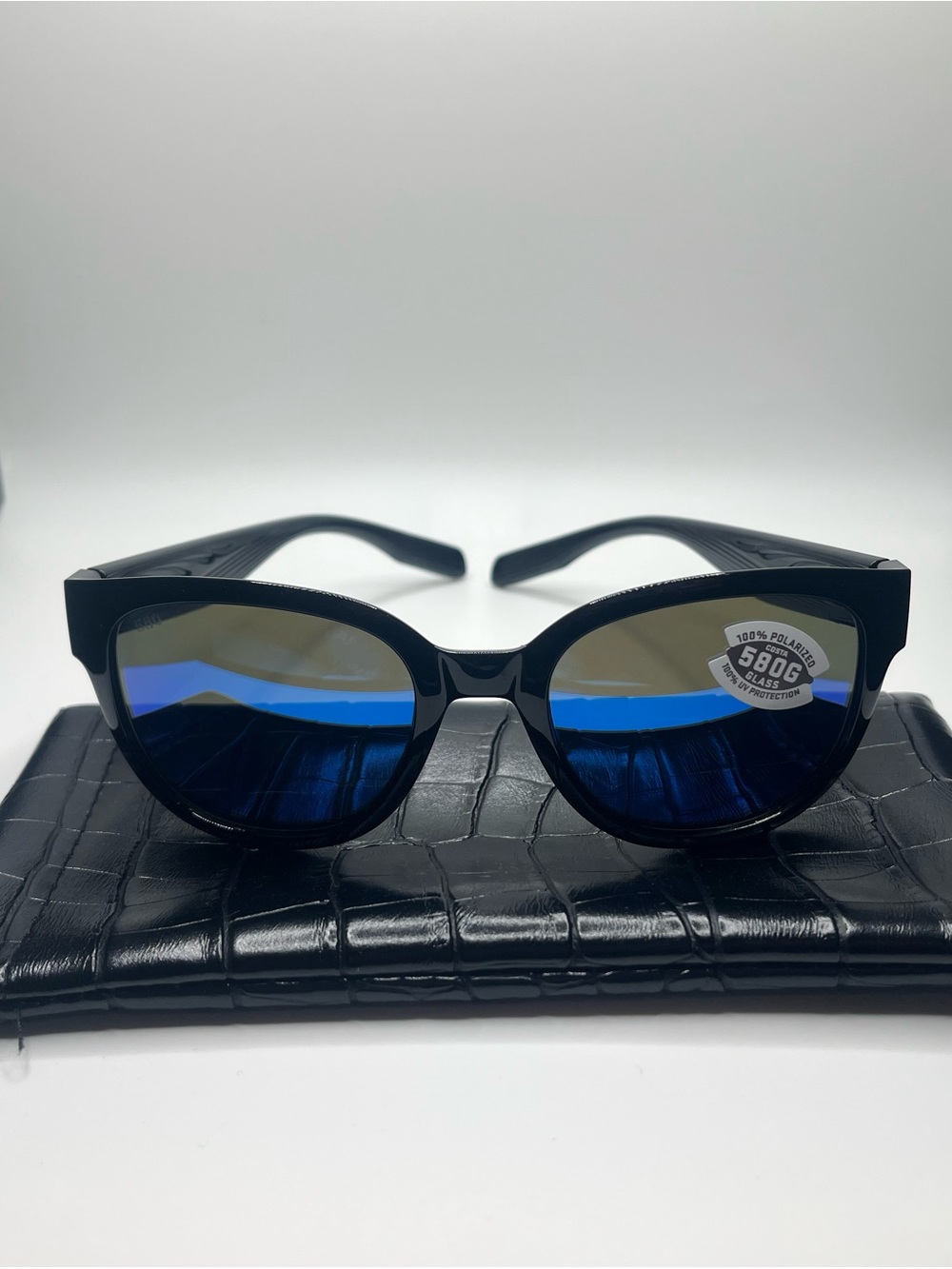 Brand New Costa Black Sunglasses with Blue Mirrored Lenses